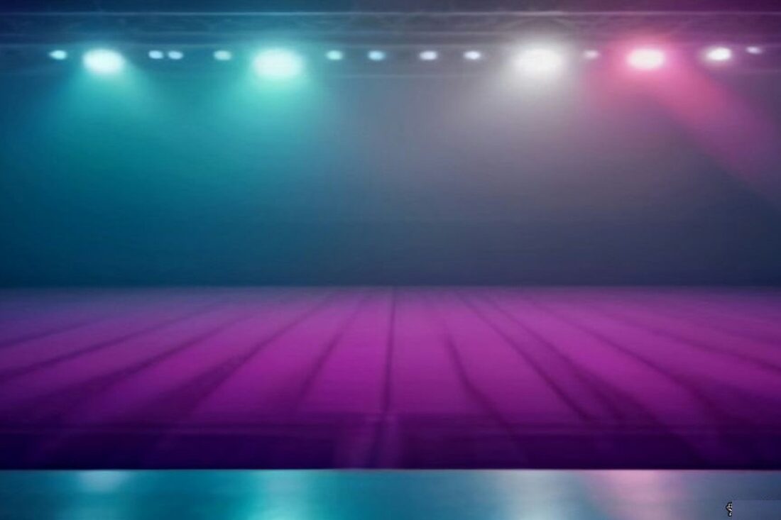 Escenario vacío de arena con luces teal y magenta entre neblina, alusivo a Aitana México 2026 en el Auditorio Nacional