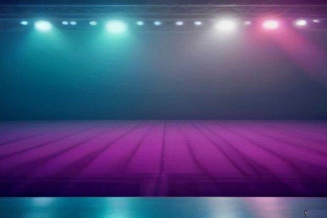 Escenario vacío de arena con luces teal y magenta entre neblina, alusivo a Aitana México 2026 en el Auditorio Nacional